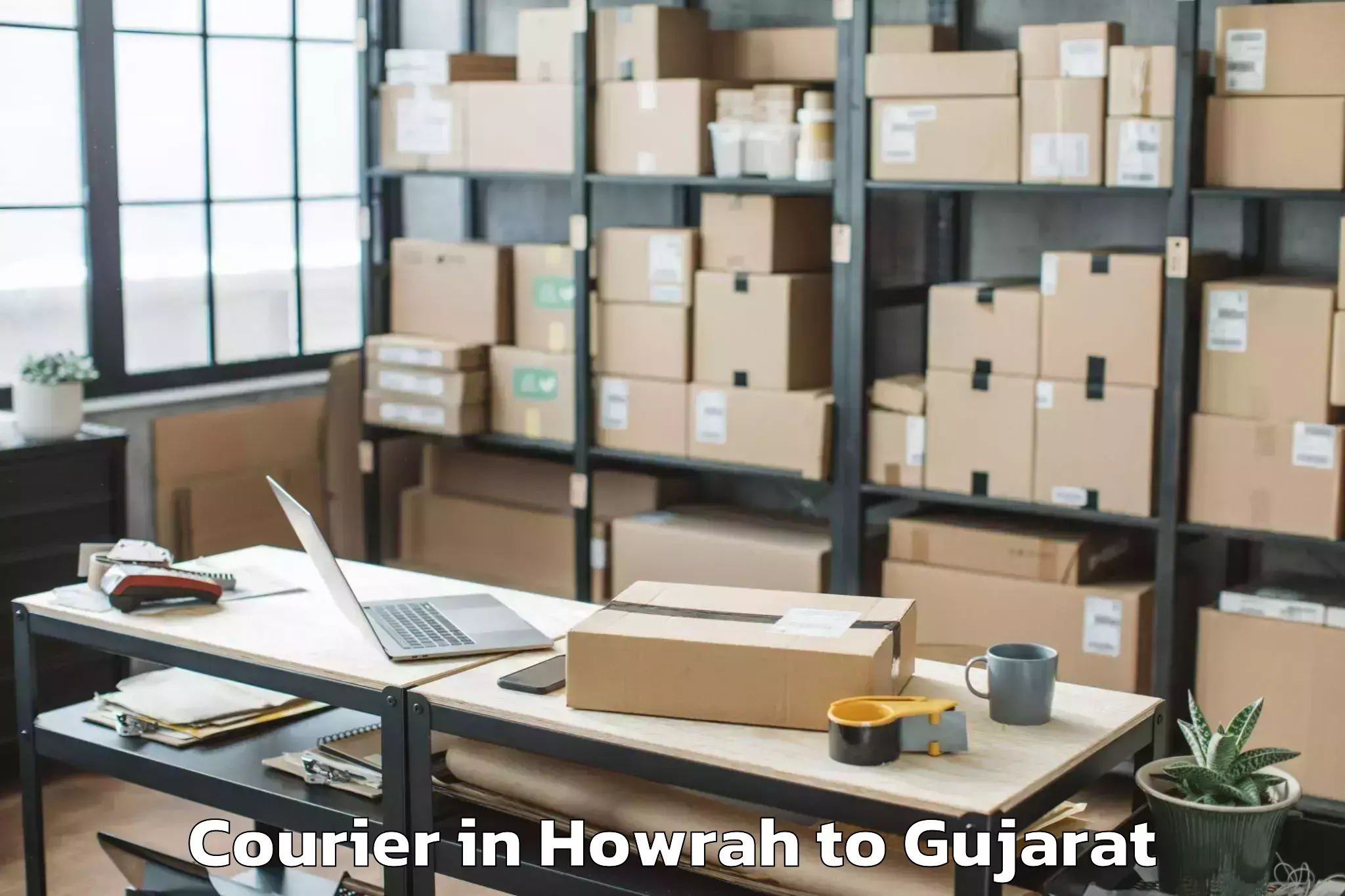 Book Howrah to Songadh Courier Online